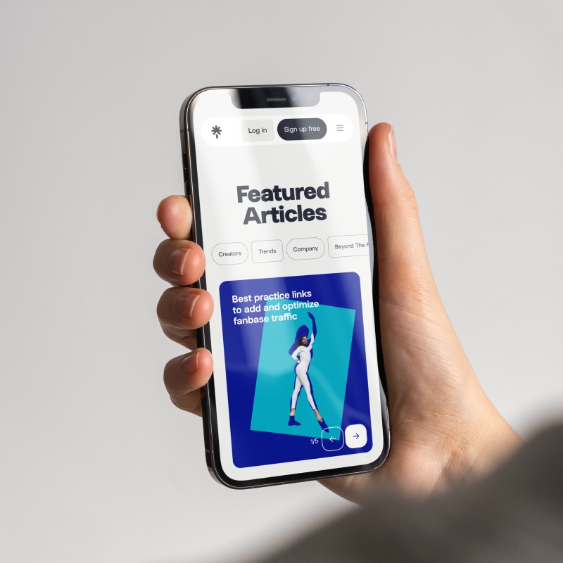 Linktree mobile product experience — clean interface with featured articles and creator content